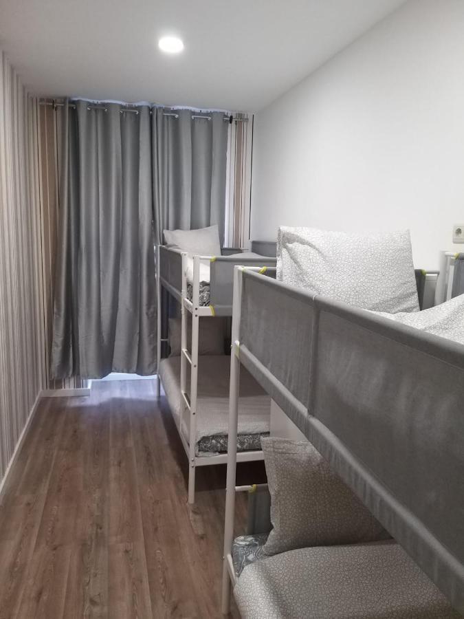 Cama em Dormitório com 4 Camas