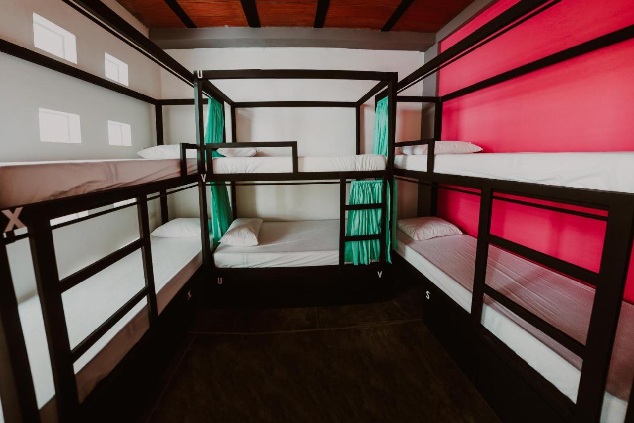 Cama en habitación compartida de 6 camas