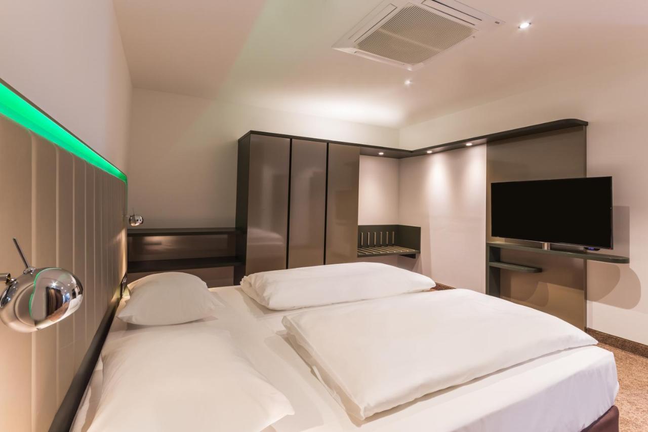 Suite mit Kingsize-Bett und Balkon