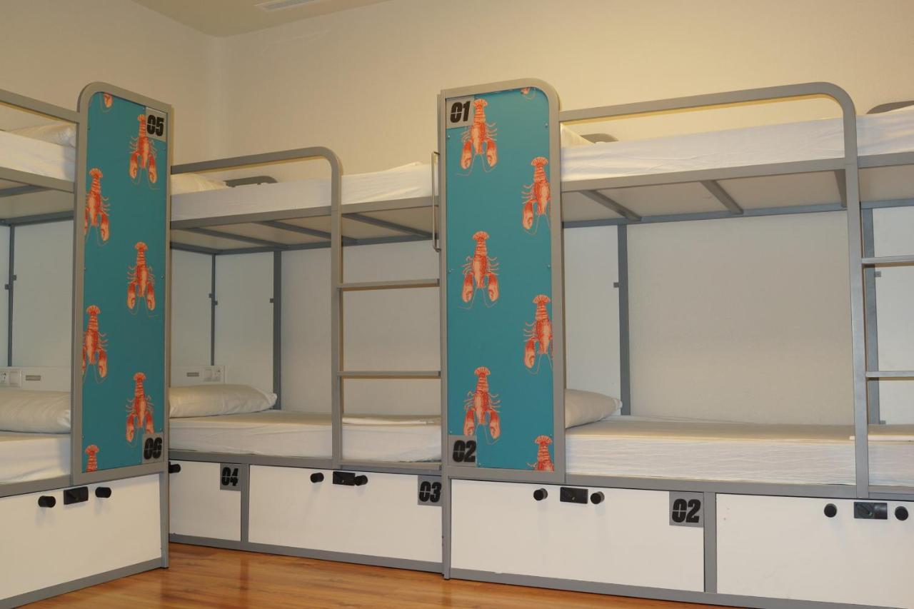 Cama individual en dormitorio mixto compartido (6 camas)