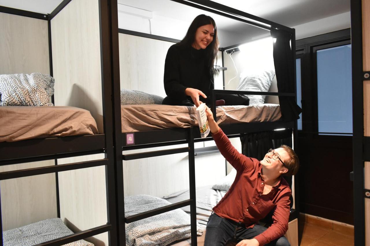 Cama en habitación compartida de 6 camas
