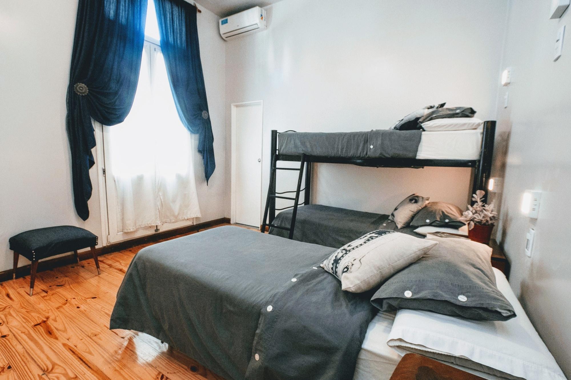 Quarto Triplo com Casa de Banho Privativa