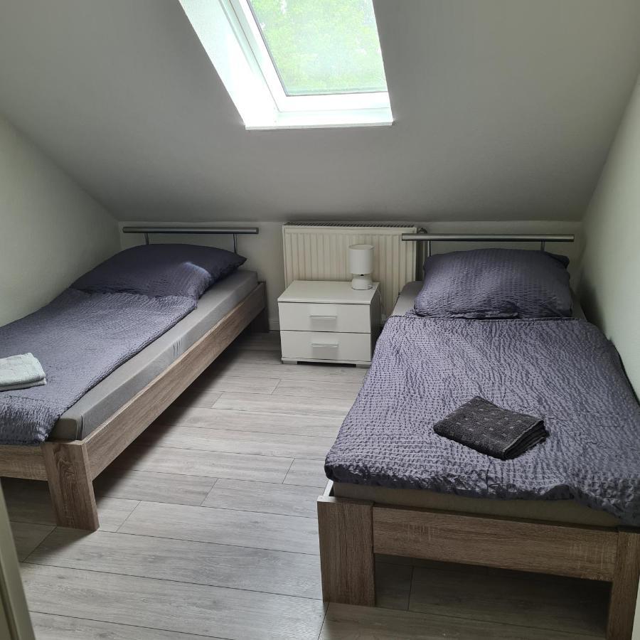 Tweepersoonskamer met 2 Aparte Bedden