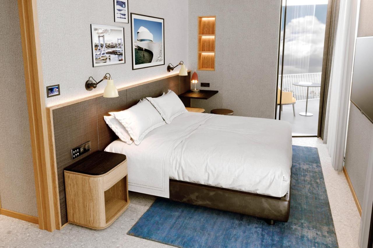 Chambre Supérieure Lit King-Size avec Balcon - Vue sur Ville