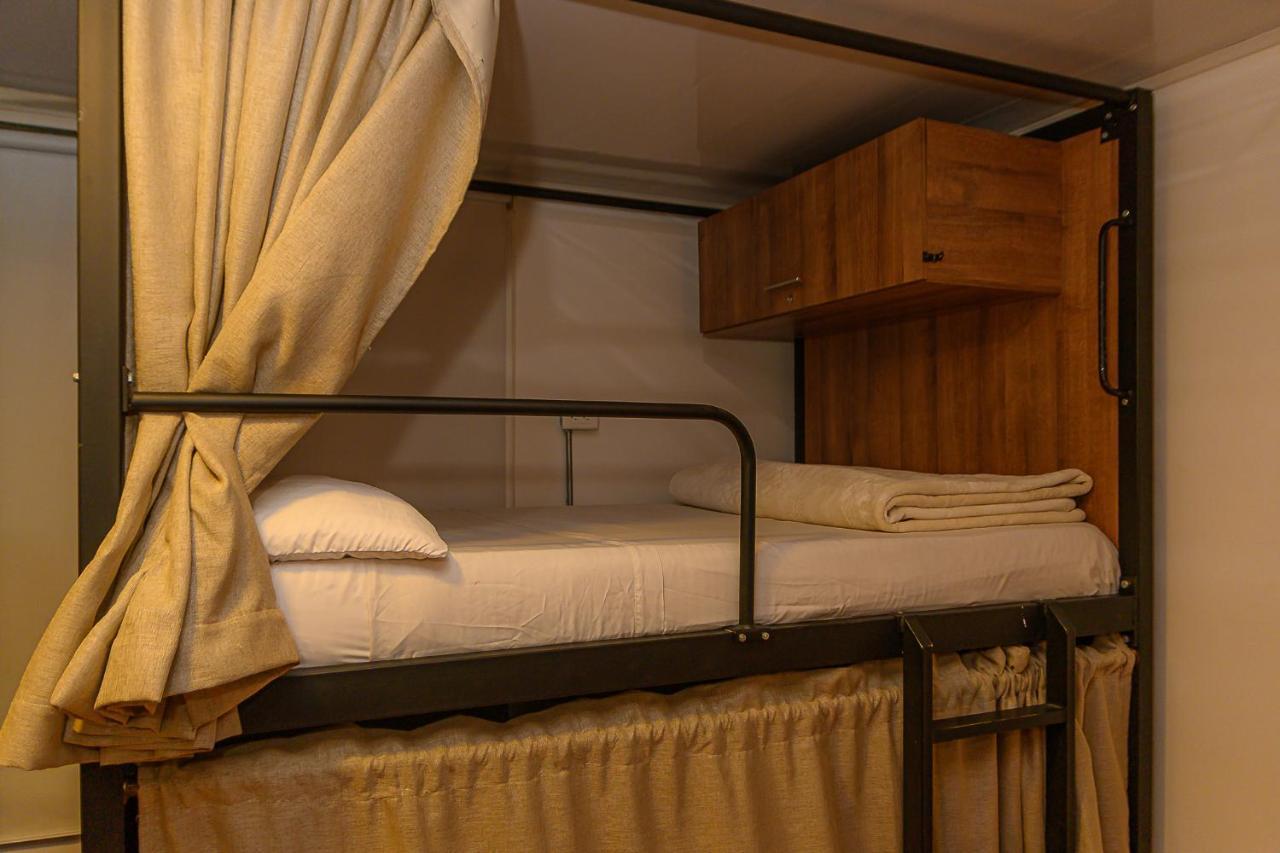 Cama en habitación compartida de 6 camas