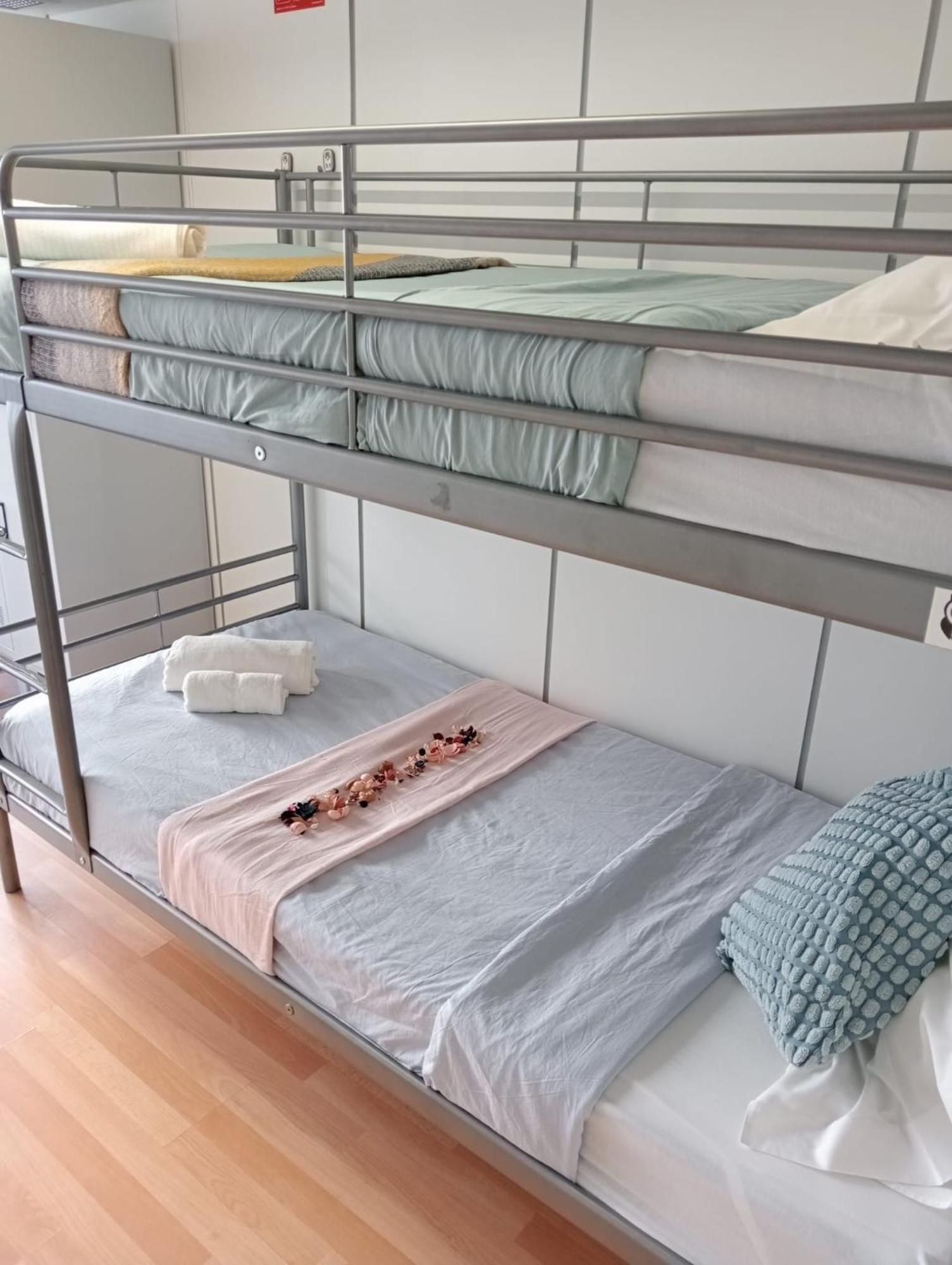Cama em Dormitório Misto com 7 Camas