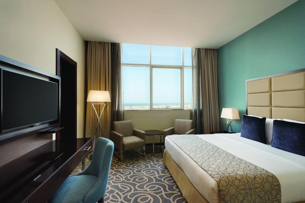 Deluxe King Room with Partial Sea View,368750272:JPEG