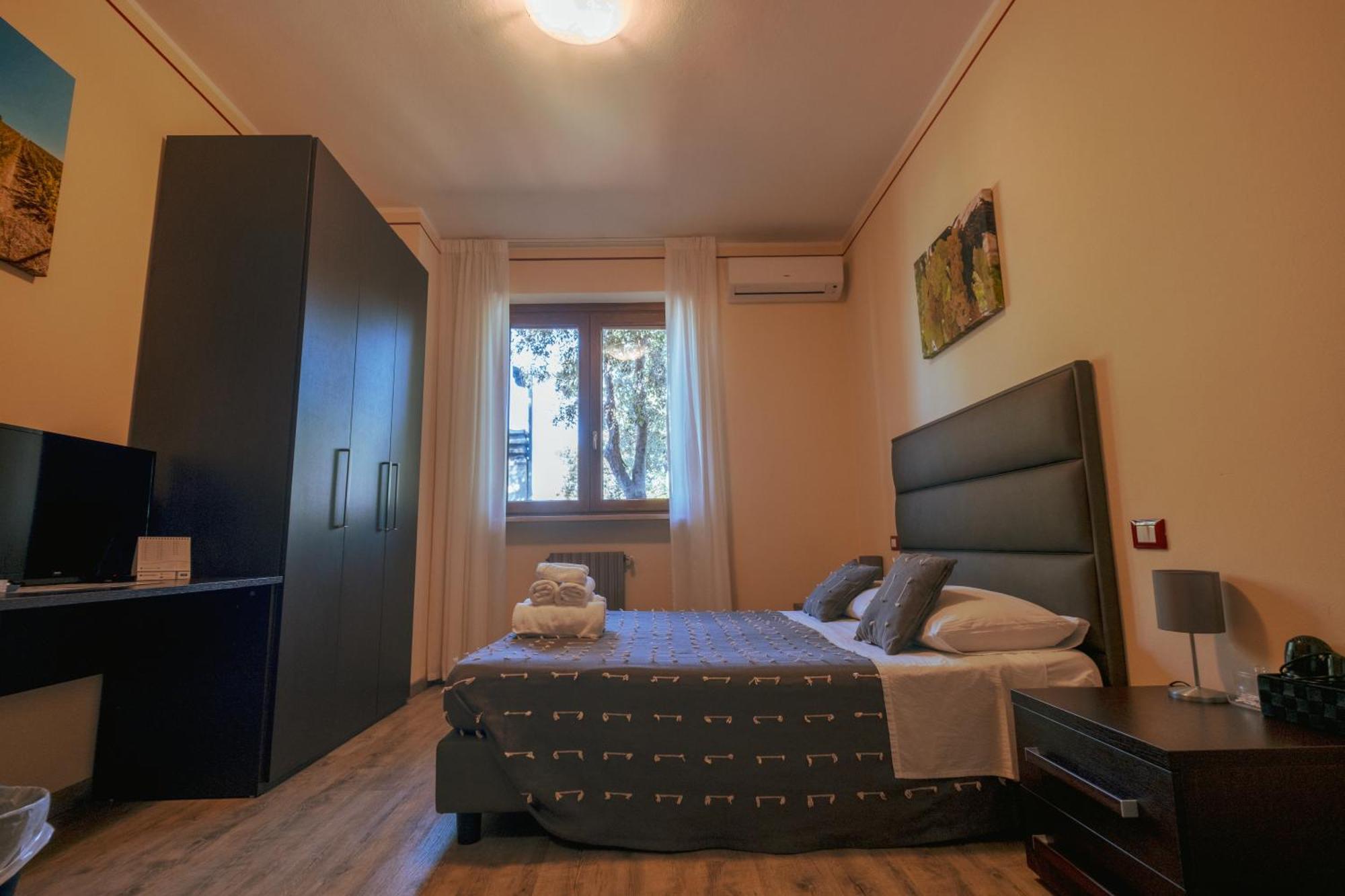 Camera Matrimoniale con Letto Supplementare