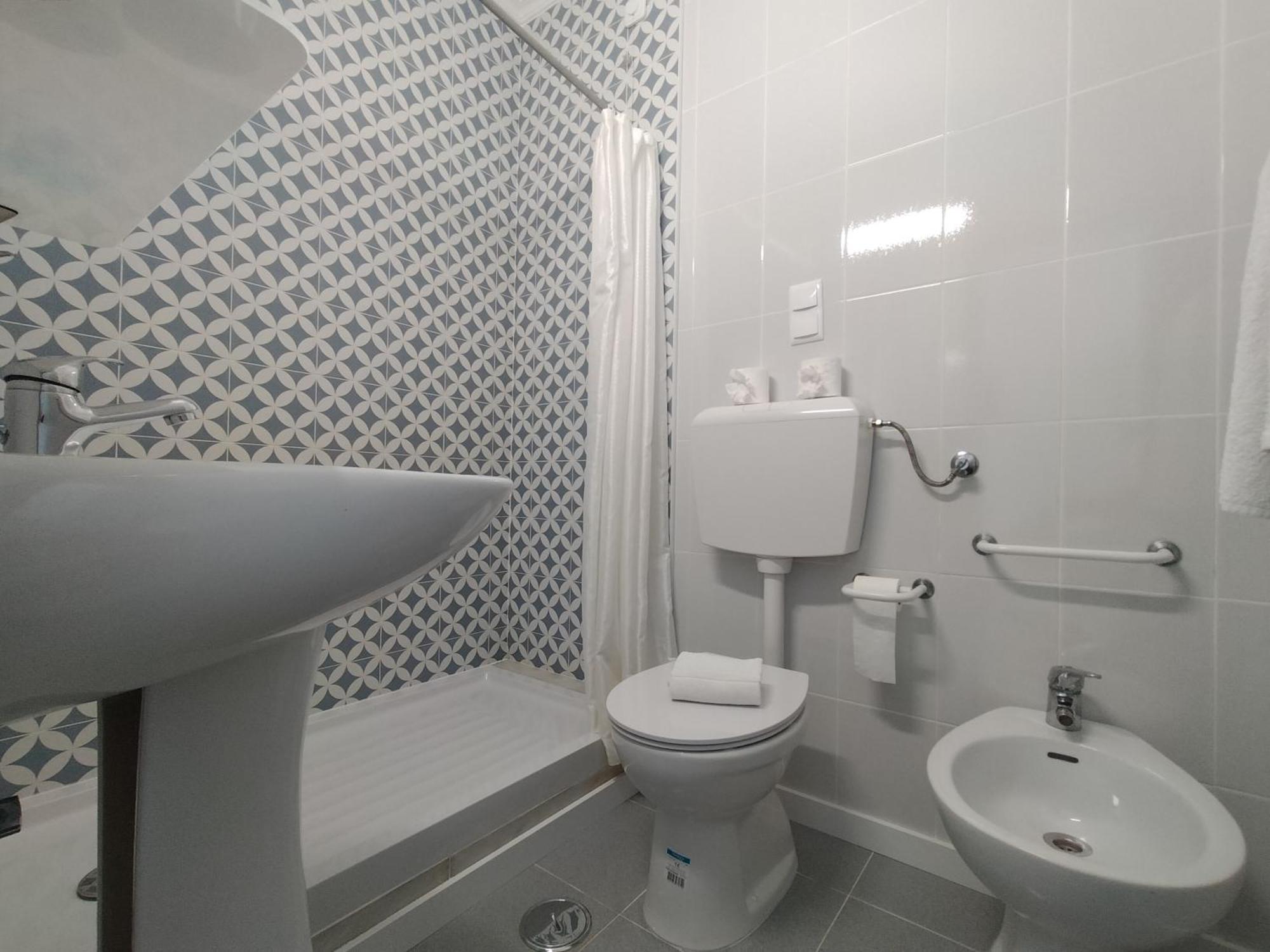 Quarto Triplo com Vista Interior