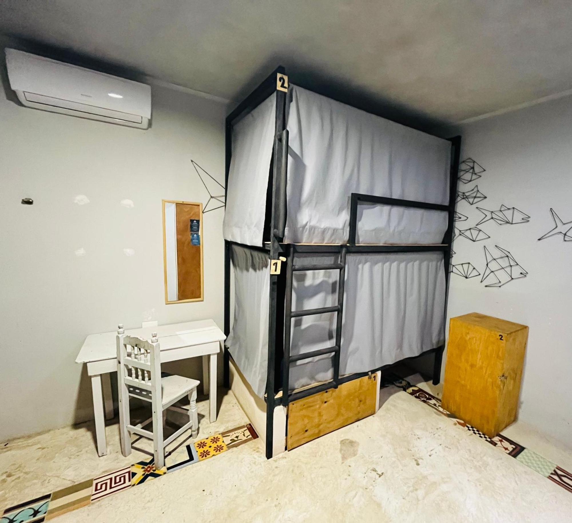 Cama en habitación compartida mixta de 6 camas