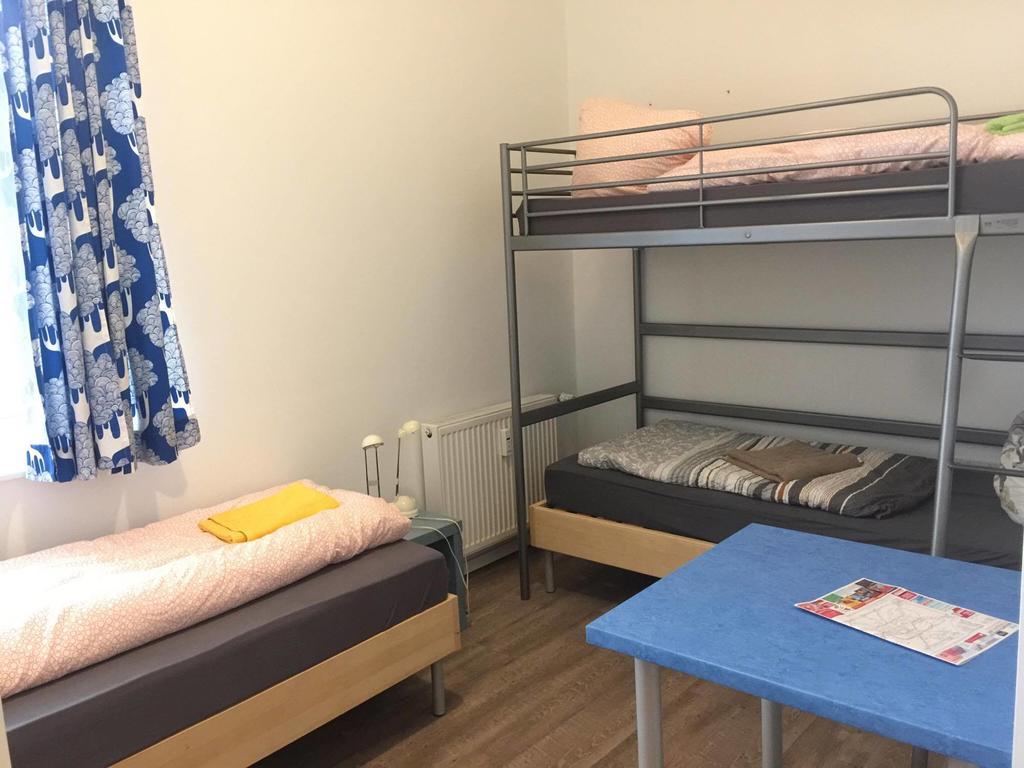 Dreibettzimmer mit Gemeinschaftsbad