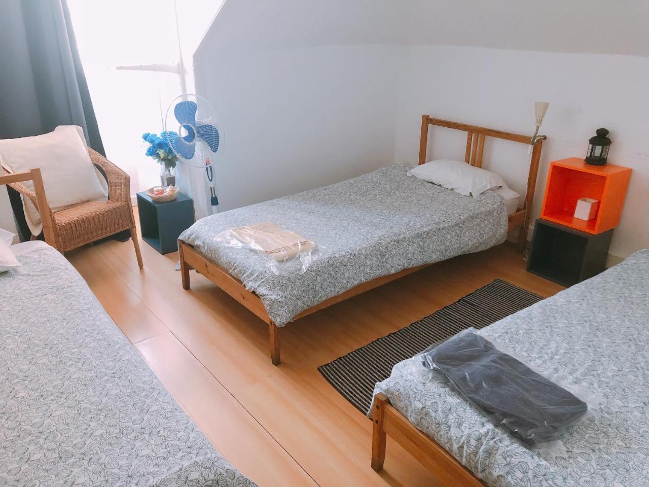 Quarto Triplo com Casa de Banho Partilhada