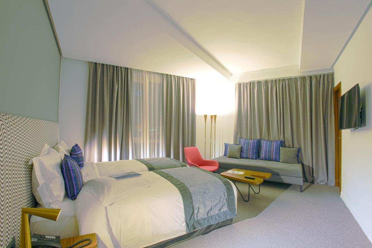 Superior Room - 2 Single Beds 1 Sofa Bed,749559431:JPEG