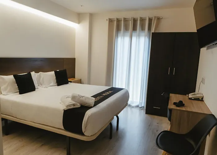 Hotel céntrico: Imprenta Musical Alojamiento