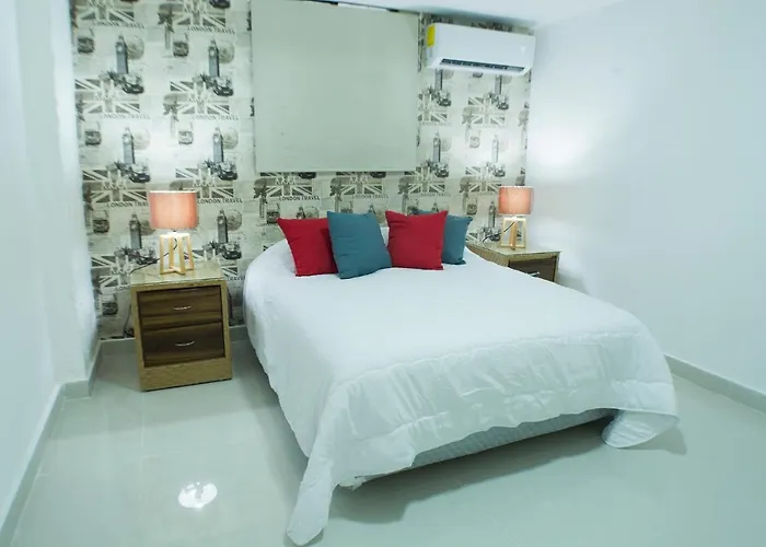 Malecon Rooms y Hotel